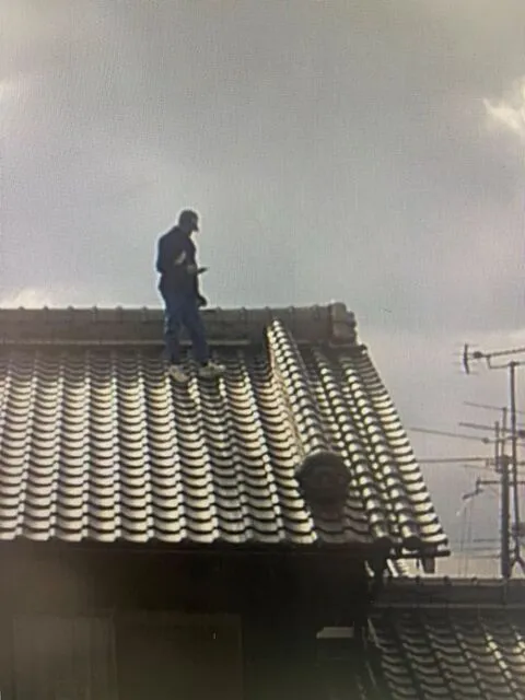 Image of a person on a roof